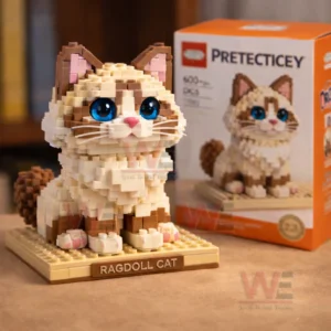 Building block ragdoll cat model with blue eyes and a nameplate on a display base with its box in the background!