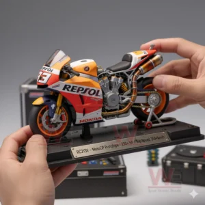 RC213V MotoGP Prototype Vinyl Figure 3 Hands holding a small racing motorcycle model with visible engine exhaust and race inspired design for close up viewing!