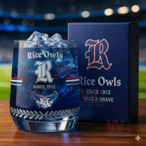 Rice Owls whiskey glass with ice and blue drink displayed on a table with a matching box inside a large sports stadium!