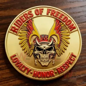 A gold coin with a winged skull design and surrounding text promoting loyalty honor and respect!