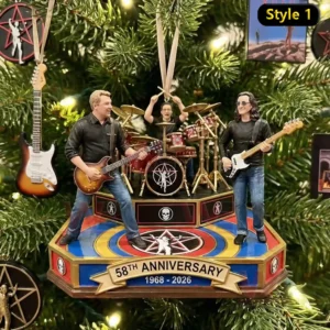 A small band performance scene ornament with three musicians positioned on a colorful stand hanging among tree branches!