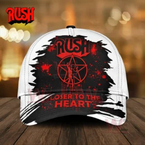 White cap with black and red rock themed graphic design displayed on a wooden surface!
