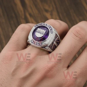 Sacramento Kings Light the Beam Sacramento Kings Ring 4 A Sacramento Kings themed ring worn on a hand with a purple gemstone and polished silver finish!