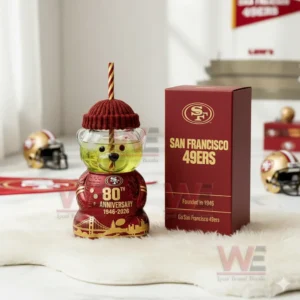 Anniversary themed bear glass cup with team box shown in a bright indoor space!