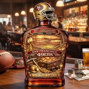 A San Francisco football inspired whiskey bottle displayed on a bar counter surrounded by drinks and a cozy sports bar background!