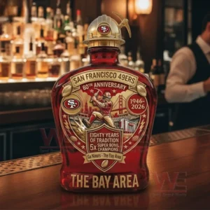 San Francisco forty niners eightieth anniversary whiskey bottle with a gold hard hat stopper on a bar counter with a blurred bar background!