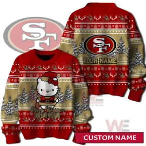 Front view of a red and gold holiday sweater with a cute character in festive clothing surrounded by snowy trees and team themed decorations!