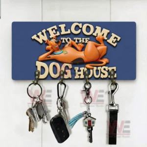 Scooby Doo Welcome to the Dog House Personalized Wall Key Holder 5 Welcome To The Dog House blue wall key holder with lounging cartoon dog and five hooks holding keys keychains and a strap shown on a white background!