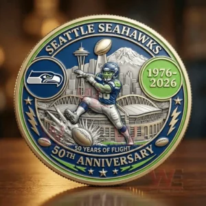 Seattle Seahawks fiftieth anniversary coin showing a football player catching a ball with the Seattle skyline stadium mountain and the years nineteen seventy six to two thousand twenty six!