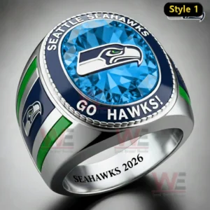 Seattle Seahawks ring with blue gemstone top and hawk logo with Seattle Seahawks text and go hawks and seahawks 2026 engraving.
