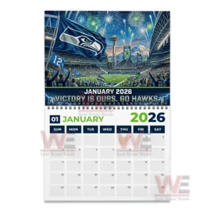 Seattle Seahawks 2026 Wall Calendar 9 July calendar page showing fireworks over a Seahawks stadium with a large twelve flag on the field!