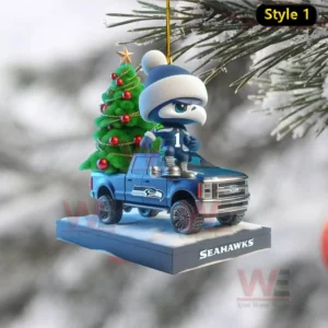 Ornament of a Seahawks mascot figure sitting on a blue pickup truck with a decorated Christmas tree!