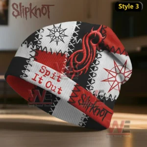 A red white and black patchwork beanie with stitched detailing a bold red emblem and matching text near the brim!