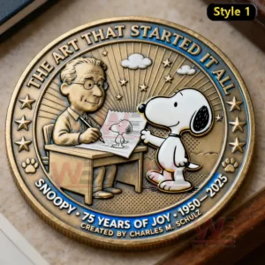 Snoopy coin showing Snoopy beside the cartoon creator at a desk with the text The Art That Started It All and Snoopy 75 Years Of Joy 1950 2025.