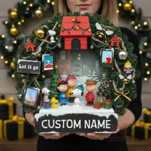 Christmas wreath with cartoon family characters doghouse pine branches gifts snow decorations and festive lights held in front of a holiday background!