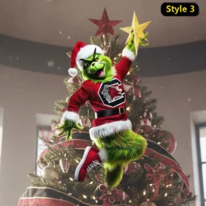 A green character in a Santa outfit reaches up to place a golden star on top of a decorated Christmas tree.