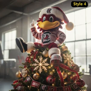 A festive bird mascot in a Santa hat sits on the top of a Christmas tree surrounded by ornaments and lights.