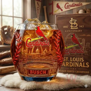 St. Louis Cardinals 143rd Anniversary Whiskey Glass 4 A St Louis Cardinals anniversary glass displayed with its themed box in a room decorated with baseball items!