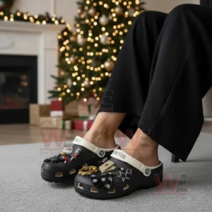 Stevie Nicks Crocs Clogs with Charm 4 Person wearing black clogs with decorative charms seated indoors near a Christmas tree!
