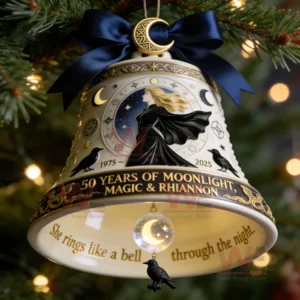 A close view of a celestial themed anniversary bell ornament decorated with a mystical figure moonlit patterns and a dangling sphere and raven charm!