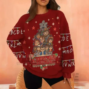 Stranger Things Christmas Things Fur Sweater 9 A person wearing a red fuzzy sweater with cartoon characters in a festive tree design.