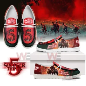 Red and black Stranger Things shoes featuring character graphics dramatic backgrounds and the text One Last Adventure!