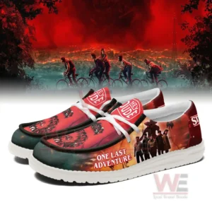 Stranger Things 5 One Last Adventure Hey Dude Shoes 8 Angled view of Stranger Things shoes featuring vibrant character art and striking red themed graphics!