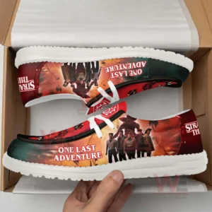 Stranger Things 5 One Last Adventure Hey Dude Shoes 9 Shoes inside a box featuring Stranger Things character art intense red background and clear themed text!