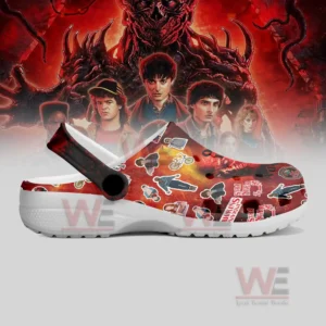 Stranger Things Crocs Crocband Clogs Shoes 7 Single shoe viewed from the side featuring bright graphics and stylized illustrations across its surface!