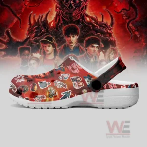 Stranger Things Crocs Crocband Clogs Shoes 8 Footwear positioned in profile highlighting multiple illustrations over a bright textured pattern!