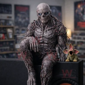 A detailed monster figure sits on a black surface with a smaller creature beside it featuring realistic textures dramatic lighting and a dark cinematic atmosphere!