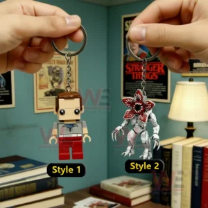 Stranger Things Steve Harrington, Dustin Henderson, and the Demogorgon Keychain 3 Two Stranger Things inspired keychains showing different character styles held in hands for comparison!