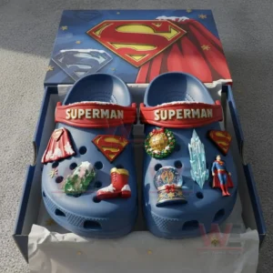 Superman themed blue clogs arranged in a gift box with festive charm decorations!