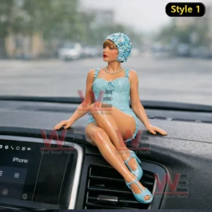 Taylor Swift Desk Companion Resin Figurine Doll 4 Female figure in a light blue outfit with matching heels and headpiece sitting on a car dashboard with legs crossed!
