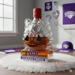 Clear glass mascot bottle with red wax sealed top amber liquid inside and a purple themed base placed on a white rug in a sports decorated room!