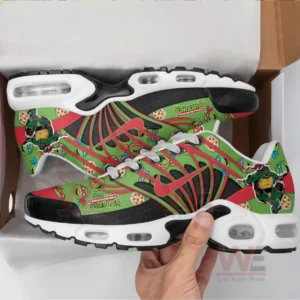 A hand holds brightly patterned sneakers from a box highlighting the animated turtle graphics and vivid color contrasts!