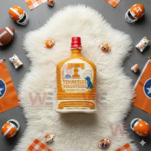 Tennessee Volunteers 134th Anniversary 1891-2025 Whiskey Bottle 7 Top down view of Tennessee Volunteers anniversary bottle on a white rug surrounded by football themed decorations!