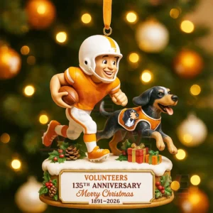 Ornament of a Tennessee football player running with a ball beside a dog on a decorated base honoring the one hundred thirty fifth anniversary!