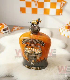 Tennessee Volunteers anniversary whiskey decanter with Smokey topper and orange design displayed indoors!