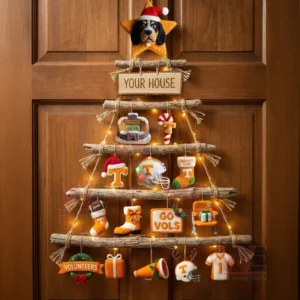 Tennessee Volunteers Go Vols Premium Rustic Wall Christmas Tree 3 A wooden door showing a rustic christmas wall tree decorated with tennessee volunteers themed ornaments and warm lights!