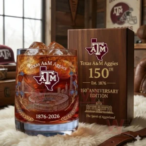 Texas A&M Aggies 150th Anniversary 1876-2026 Whiskey Glass 5 A Texas A M Aggies themed anniversary glass and wooden box displayed together on a soft white surface in a rustic room!