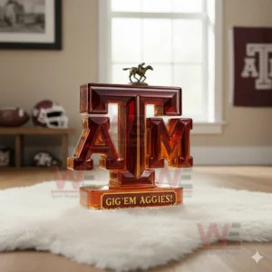 A Texas A M bottle with a rider figure on top standing on a rug in a bright sports decor setting!