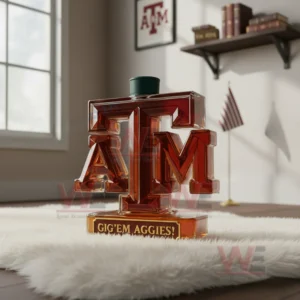 A Texas A M bottle with a green top standing on a fluffy rug in a warm bright room!