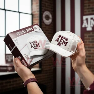 Texas A&M Aggies Brick-Built Cap Building Blocks 5 Hands holding a brick built Texas A M cap with product box in a decorative room!
