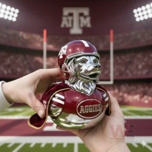 Hands holding a shiny mascot duck figure with helmet and cape in front of a football field and goalposts!