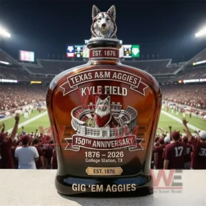Texas A&M Aggies Kyle Field 150Th Anniversary Gig 'Em Aggies Whiskey Bottle 5 A Texas AM Aggies themed whiskey bottle positioned in front of a football stadium crowd under bright stadium lights!