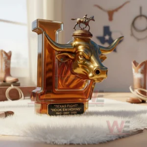 Bottle shaped like the letter L with a golden longhorn head and rider figurine sitting on a white rug in a western themed room!