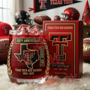 A Texas Tech Red Raiders anniversary glass filled with ice positioned next to a themed box surrounded by team memorabilia!