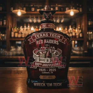 A Texas Tech Red Raiders themed whiskey bottle standing on a bar counter with warm lights and liquor shelves creating a premium celebratory atmosphere!