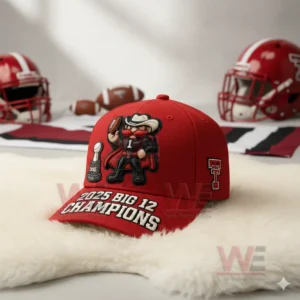 Red championship football cap with mascot embroidery resting on a white fur surface with football equipment in the background!